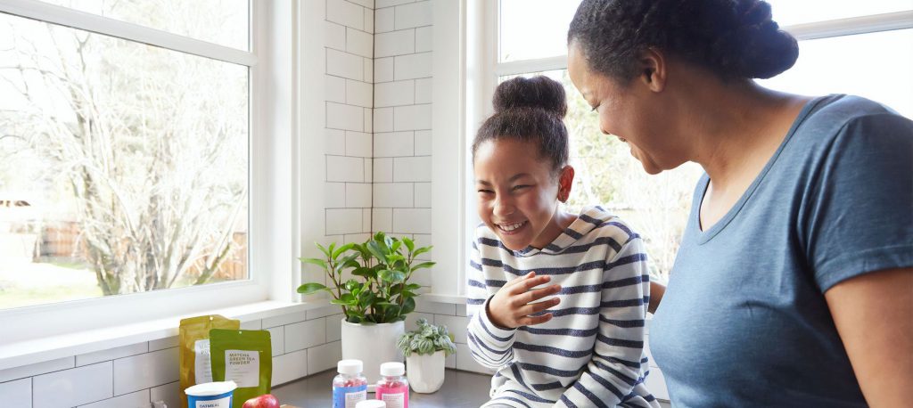 Mom and child laughing