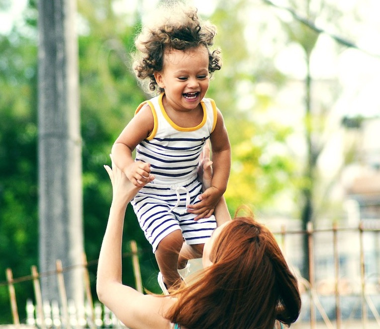 Mom playing with toddler